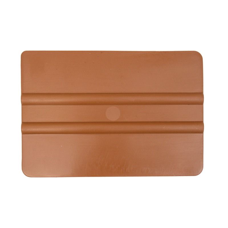 Zacht gouden kunststof rakel